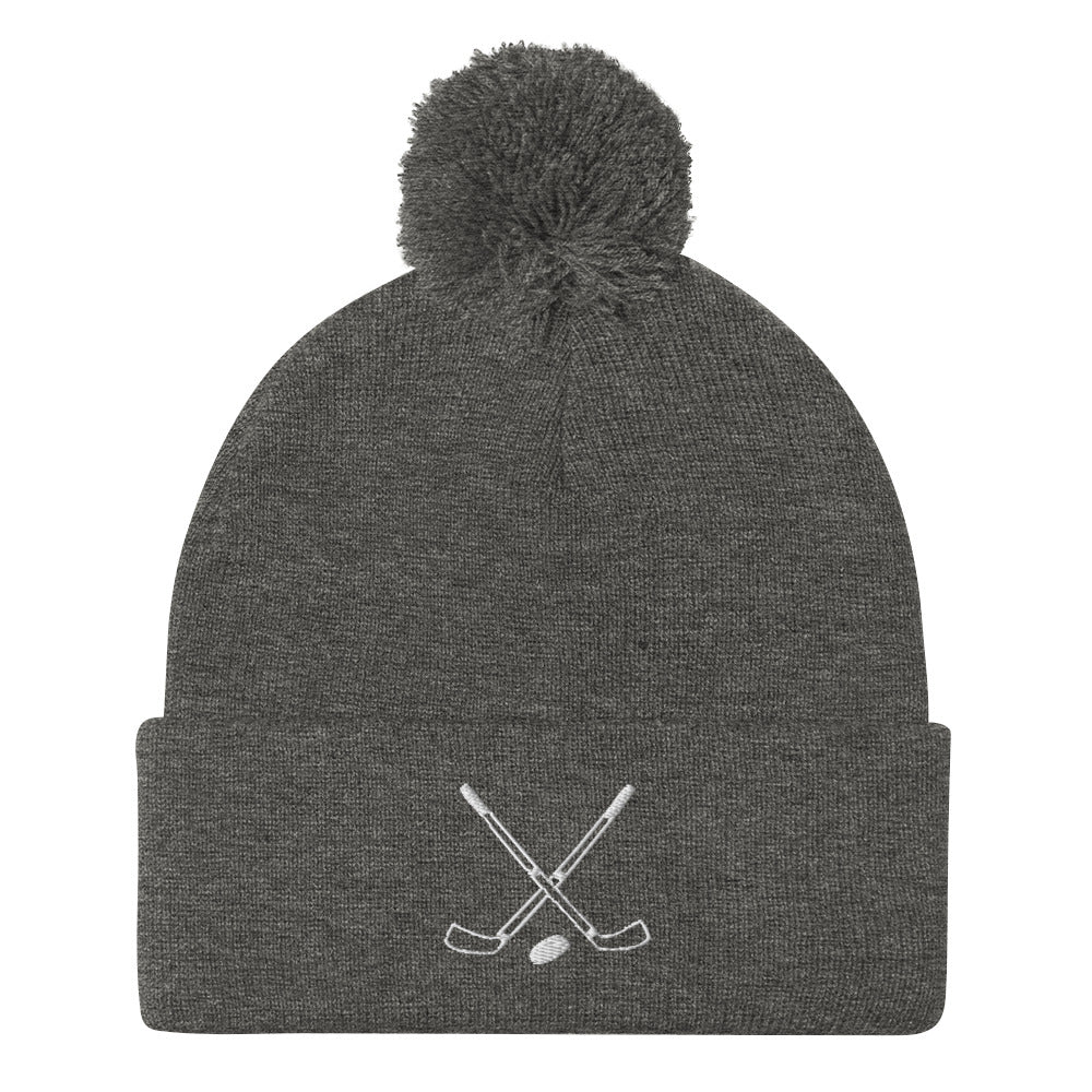Crossed Sticks Pom-Pom Beanie