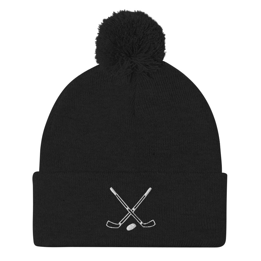 Crossed Sticks Pom-Pom Beanie